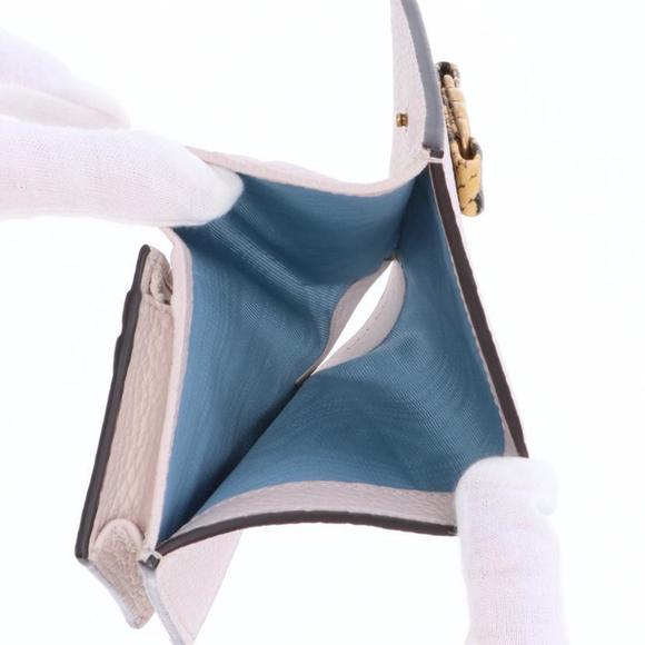 Gucci Interlocking G Python Bow Wallet - Picture 5 of 8